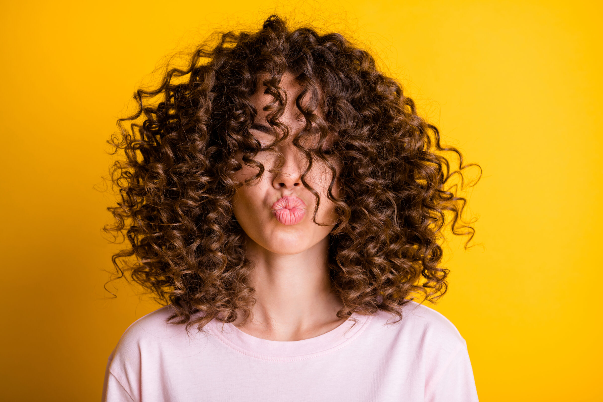 Curl-tastic Travel Tips: Mastering Your Curls on the Go